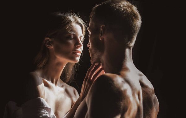 Couple in love face to face, tender hugging and kissing. Beautiful woman and handsome man boyfriend.