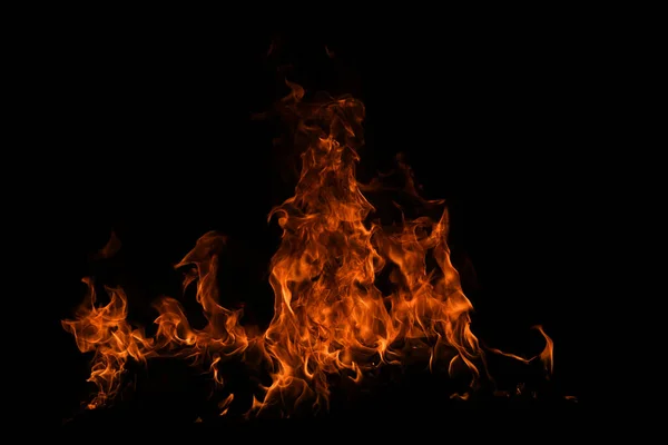 Текстура огня на черном фоне. Абстрактный огненный фон, большой горящий огонь. — стоковое фото