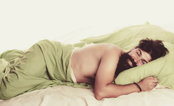 Young man sleeping in bed with pillows at home. Handsome man in bed. sleeper. Wake up Sleepy. — Stock Photo, Image