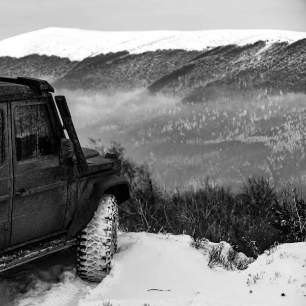 Winter offroad. Car tires on winter road covered with snow. — Stock Photo, Image