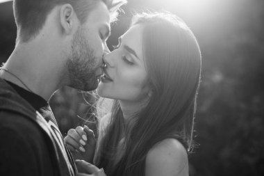 Sensual kissing on sunset. Couple In Love. Intimate relationship and sexual relations. Closeup mouths kissing. Passion and sensual touch. Romantic and love. clipart