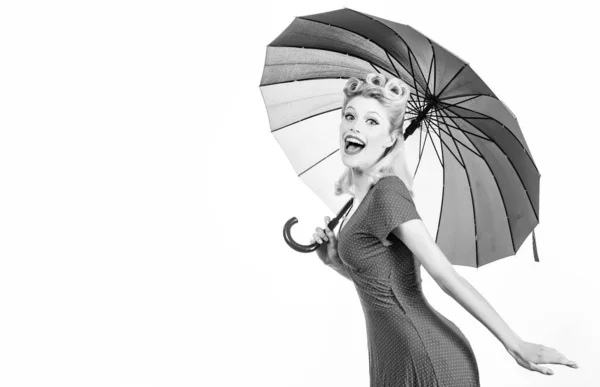 Happy pinup woman with umbrella at rainy weather. Rain rainbow autumn mood, pin up girl in red dress isolated white. — Stock Photo, Image