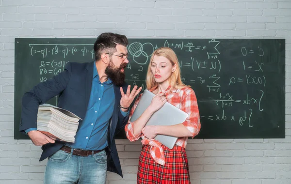 School mathematics lessons. University seminar. Tutor. Tutoring. Concentrated students following explanations of teacher in class. Students preparing for university exams. Education. — Stock Photo, Image