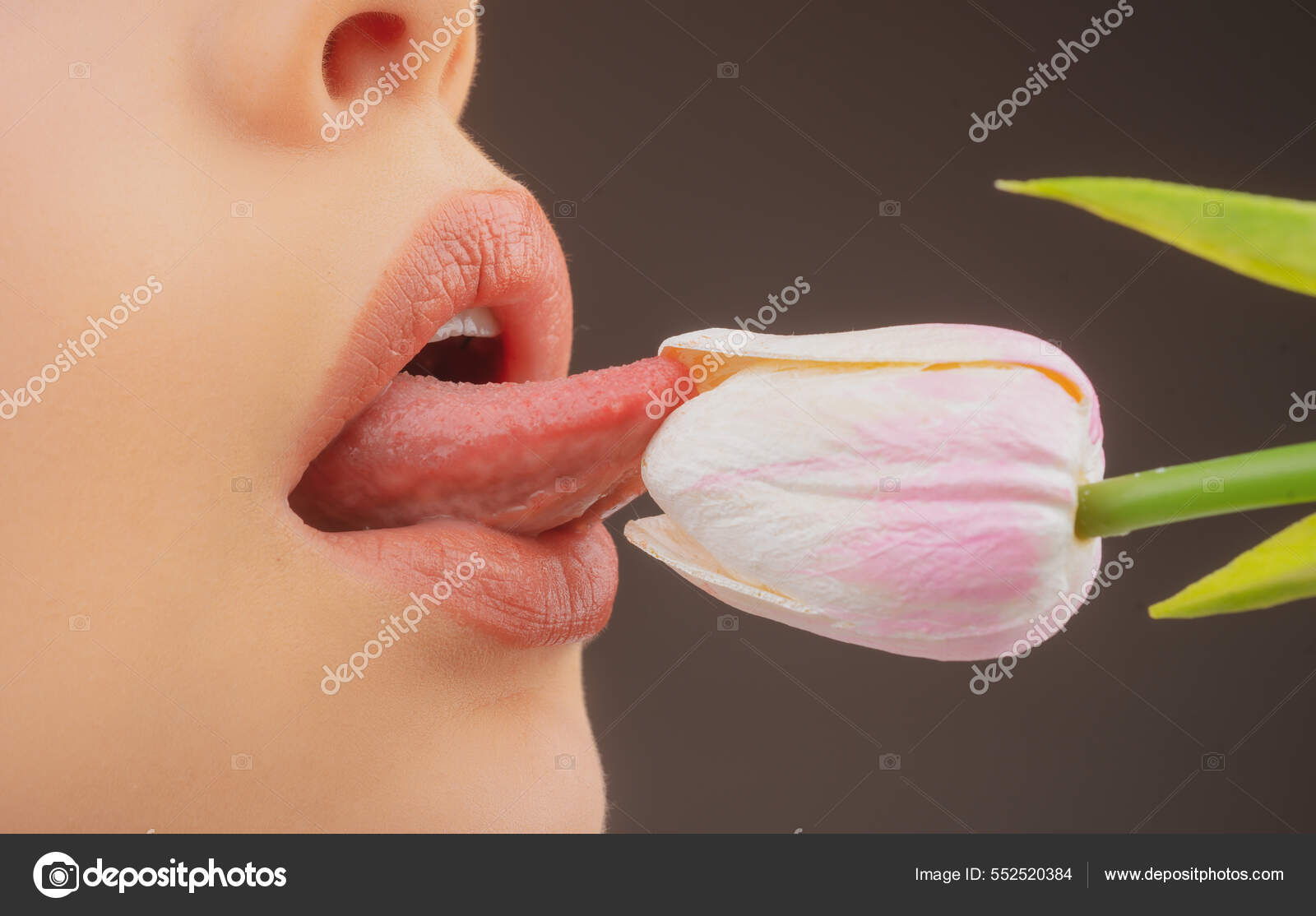 Lips and spring flower. Sexy woman mouth and flowers. Oral sex, orgasm, blowjob, licking flower pic