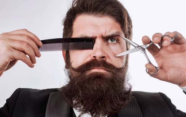 Bearded man with long moustache. Man in barbershop. Handsome bearded man with long beard moustache and brunette hair on white background. Brutal hipster in barbershop. — Stock Photo, Image