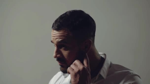 Man emotions faces. Serious guy imagining plan or idea. Thinking man on gray background. Worried face expressions. Closeup portrait of handsome male model. Gay confused, thinking or worried. — Stock Video