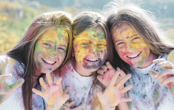 Children with creative body art. Crazy hipster girls. Summer weather. positive and cheerful. colorful neon paint makeup. Happy youth party. Optimist. Spring vibes. Colorful holi on painted face — Stock Photo, Image