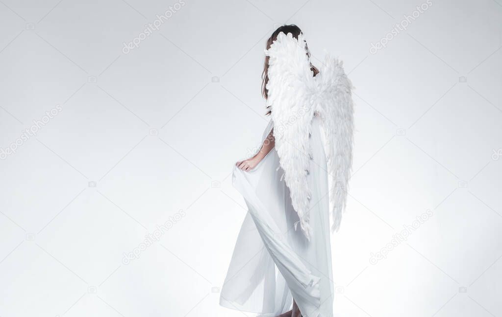 Angel girl. Long white wings. Wonderful blonde angel girl with white wings.