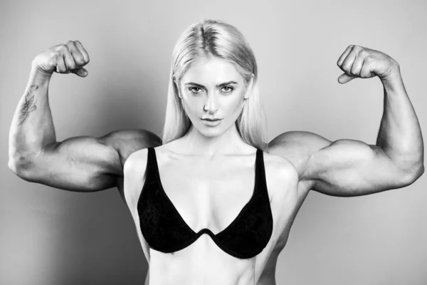 Woman power. Girl with drawn hands powerful. Young fit model. Strong and confident woman flexing her muscle. Woman rights, leadership, protest, feminism. — Stock Photo, Image