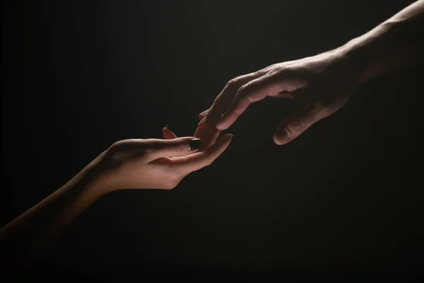 Hands at the time of rescue. Friendly handshake, friends greeting, teamwork, friendship. Tenderness, tendet touch. — Stock Photo, Image