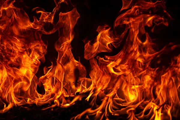Fire flames on black background. Fire burn flame isolated, abstract texture. Flaming effect with burning fire. — Stock Photo, Image