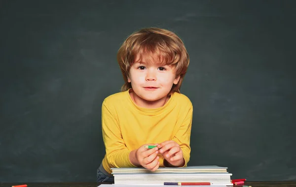 Happy smiling pupils drawing at the desk. Talented child. Education first. Elementary school. School concept. — Photo