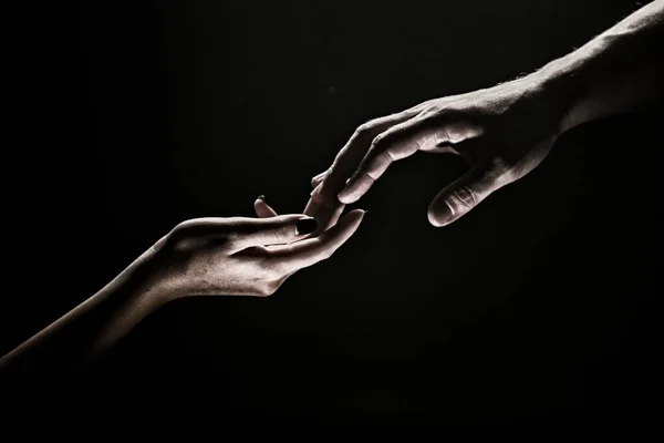 Hands at the time of rescue. Friendly handshake, friends greeting, teamwork, friendship. Tenderness, tendet touch. — Stock Photo, Image