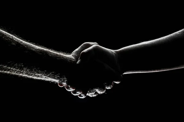 Handshake between the two partners, agreement. Male hands rescue. Friendly handshake, friends greeting, friendship. Rescue, helping gesture or hands. Helping hand. — Stock Photo, Image