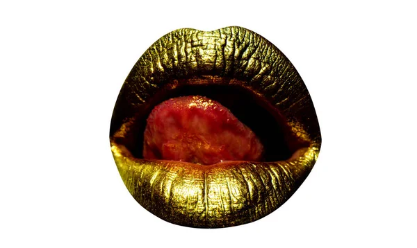 Golden lips with gold lipstick on isolated background. Sensual girl or woman mouth with gold. Tongue licking gold lip. Glamour background. — Stok fotoğraf