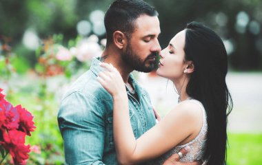 Portrait couple in love kiss. Passion dating and love. Seduction concept. Romantic portrait of a sensual couple in love. Secrets fantasy. Making love to young lover.