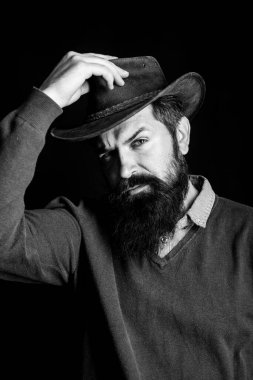 Vahşi Batı. Teksas kovboyu. Yakışıklı bir erkek portresi. Amerikan kovboy filmi. Retro biçimi.