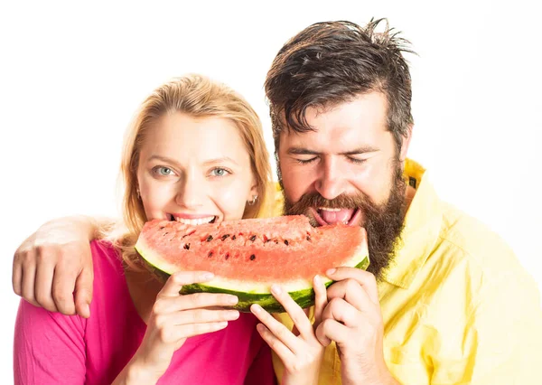 Funny couple lovers eating watermelon, closeup face. isolated on white background. Cheerful couple holding slices of watermelon. — Stock Fotó