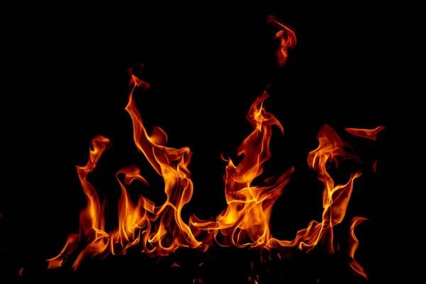 Wzór ruchu płomienia ognistego abstrakcyjna tekstura. Płonący ogień, płomień pokrywający tło. — Zdjęcie stockowe