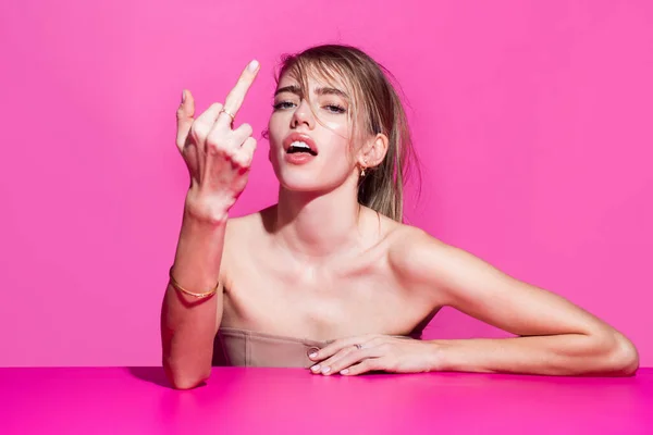 Fashion glamor swag young woman model show middle finger, fuck you off sign. Bad expression, provocation and rude attitude. — Stockfoto
