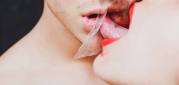 Girl sexy tongue lick guy. Safe sex. Oral condom concept. Protecting health. Health protection. Sexually transmitted diseases. Sexual activity. Sex health. Couple kissing through transparent plastic.