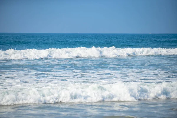 Blue ocean wave, ocean waves, natural background. Blue clean wavy sea water