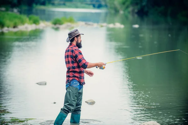 Young Bearded Man Fishing Lake River Flyfishing — стоковое фото