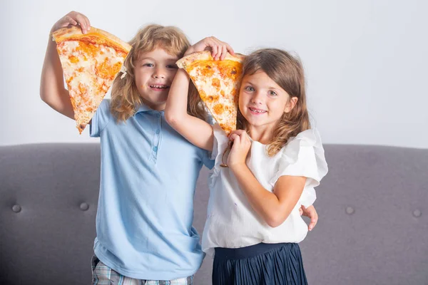 Two Children Eating Pizza Smiling Indoors Happy Smiling Kids Holding — Stock Photo, Image