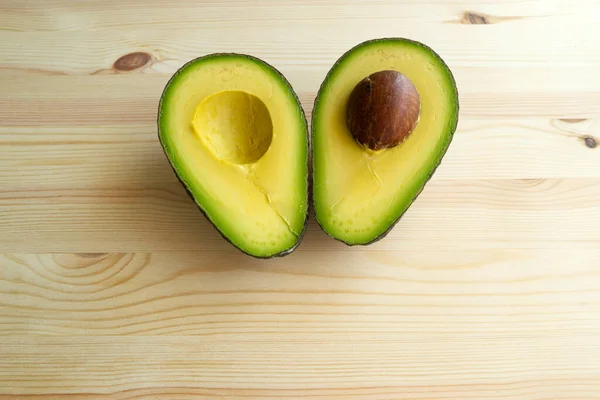 Halb Avocado Rohe Früchte Gesunde Grüne Lebensmittel Avocado Auf Holzgrund — Stockfoto