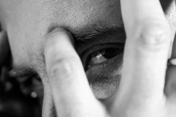 Close up portrait of handsome man. Guy covered face with hands and doing stop gesture with sad and fear expression