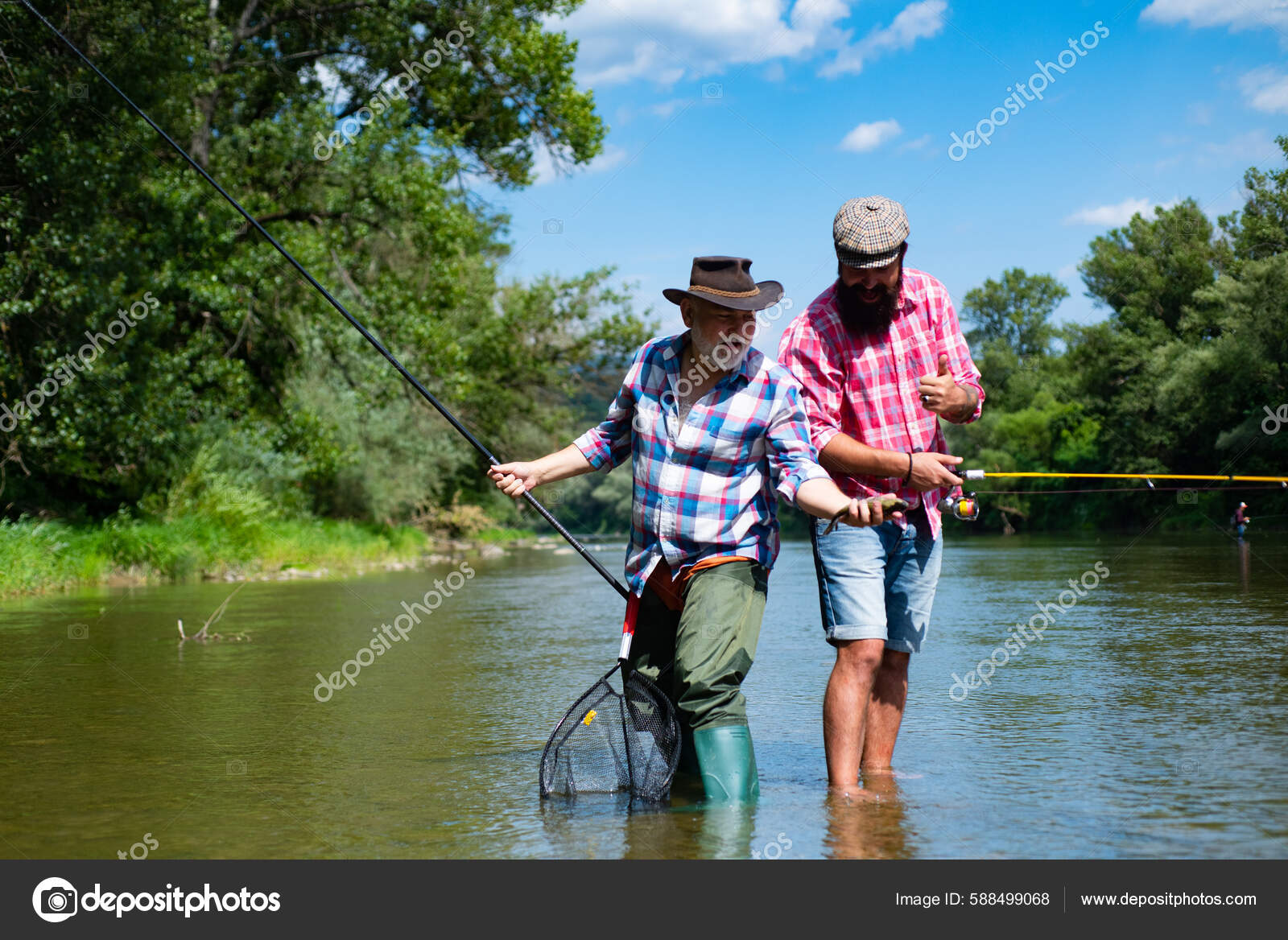 Young Old Fisherman Standing Shore Lake Fishing Rod Father Son