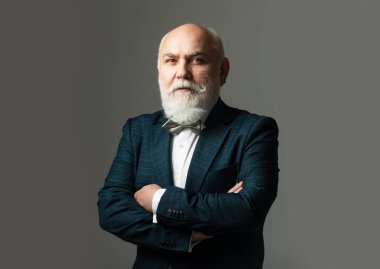 Senior Man. Confident businessman posing with folded arms