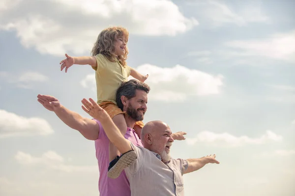 Men Generation Grandfather Father Grandson Playing Raising Hands Open Arms — Stockfoto