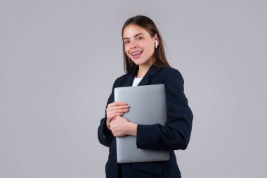 Charming positive lady hold laptop, isolated background. Young secretary
