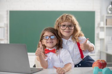 School friends learning together. Back to school. Schoolchild friends back to school at knowledge day