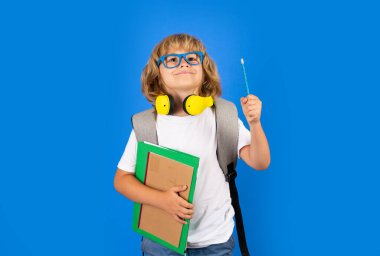 Learning knowledge and kids education concept. School teen boy in with backpack. Thinking pensive kids, thoughtful emotions of school child, clever smart funny nerd have idea
