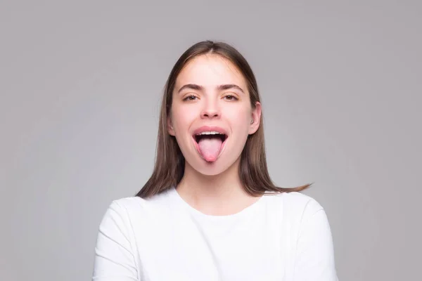 Beautiful Modern Model Shows Tongue Model Sticking Tongue Out Girl — Fotografia de Stock