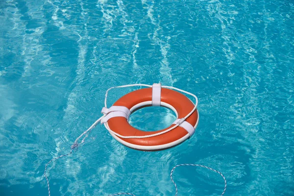 Safety equipment, Life buoy or rescue buoy floating on sea to rescue. Help in water concept