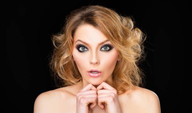 Shocked face of surprised young woman. Funny female shocked face expression. Portrait of excited woman spreading hands