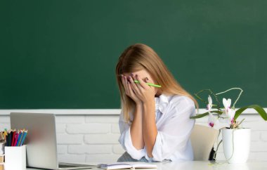 Female shame embarrassed student on lesson lecture in classroom at high school or college