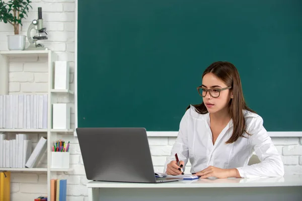 Portrait of female university student study lesson at school or university, online learning at school, distance education