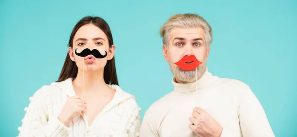 Transgender gender identity, equality and human rights. Concept of gender equality, equal rights for both sexes. Male female portrait. Funny couple of woman with moustache and man with red lips