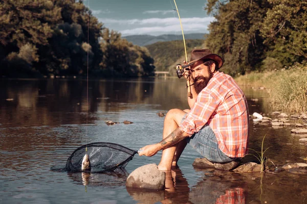 Young Bearded Man Fishing Lake River Flyfishing — стоковое фото