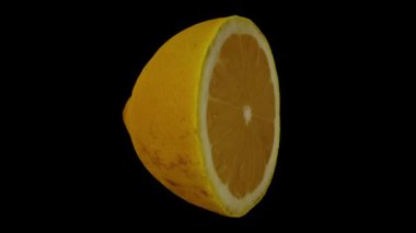 Siyah arka planda dönen yarım Lemon 'un gerçekçi canlandırması. Video kusursuz bir şekilde döngüye giriyor ve üç boyutlu nesne gerçek bir limondan taranıyor..