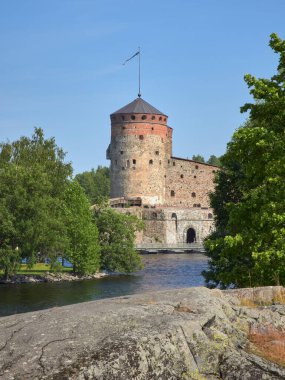 Summer view of the old Olavinlinna fortress in the Finnish city of Savonlinna.