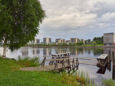 Finnish Joensuu near Pielisjoki river: new neighborhoods, modern architecture, carpet cleaner.