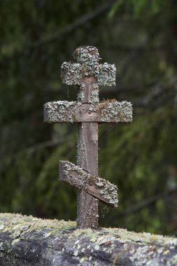 In old cemetery of Uusi Valamo orthodox monastery in Finland: chapel, crosses, orthodox tradition.