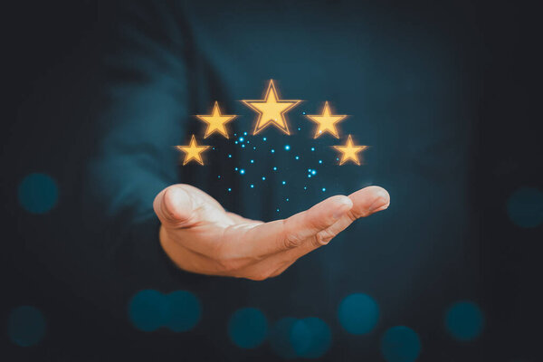 Man give positive reviews for customer satisfaction surveys, Five star rating, Customer assessment feedback, Service rating satisfaction concept.