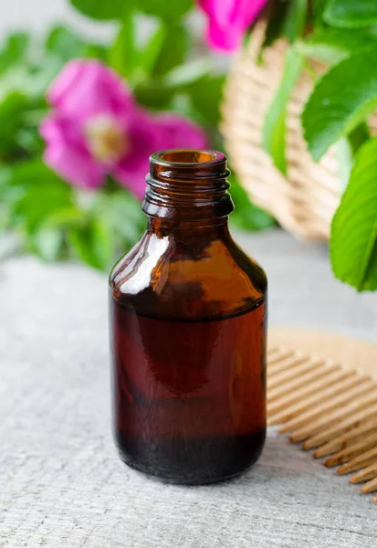 Small Bottle Essential Oil Extract Infusion Tincture Old Wooden Background — Stockfoto