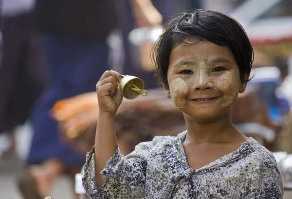 Young Bells seller in the street — Stock Photo, Image